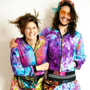Man & woman wearing Emma's Emporium tie dye clothing